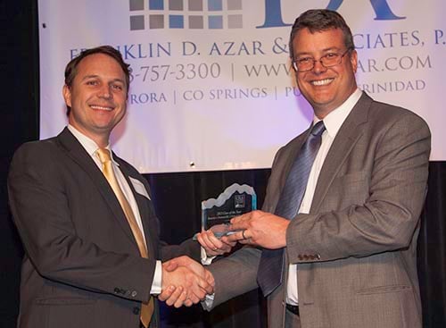Paul Maxon receives the 2015 Case of the Year Award from CTLA President Ross Pulkrabek.