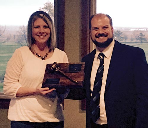 Outgoing President Lisa Weibel and incoming President Lee Morehead.